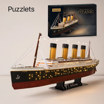 Model of the Titanic with a Puzzlets box in the background